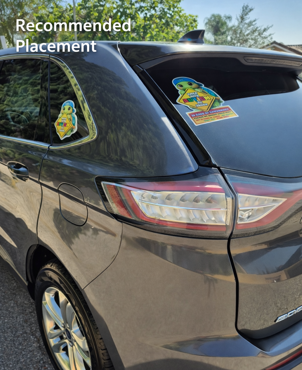 Car with stickers on the back window, labeled 'Recommended Placement'.
